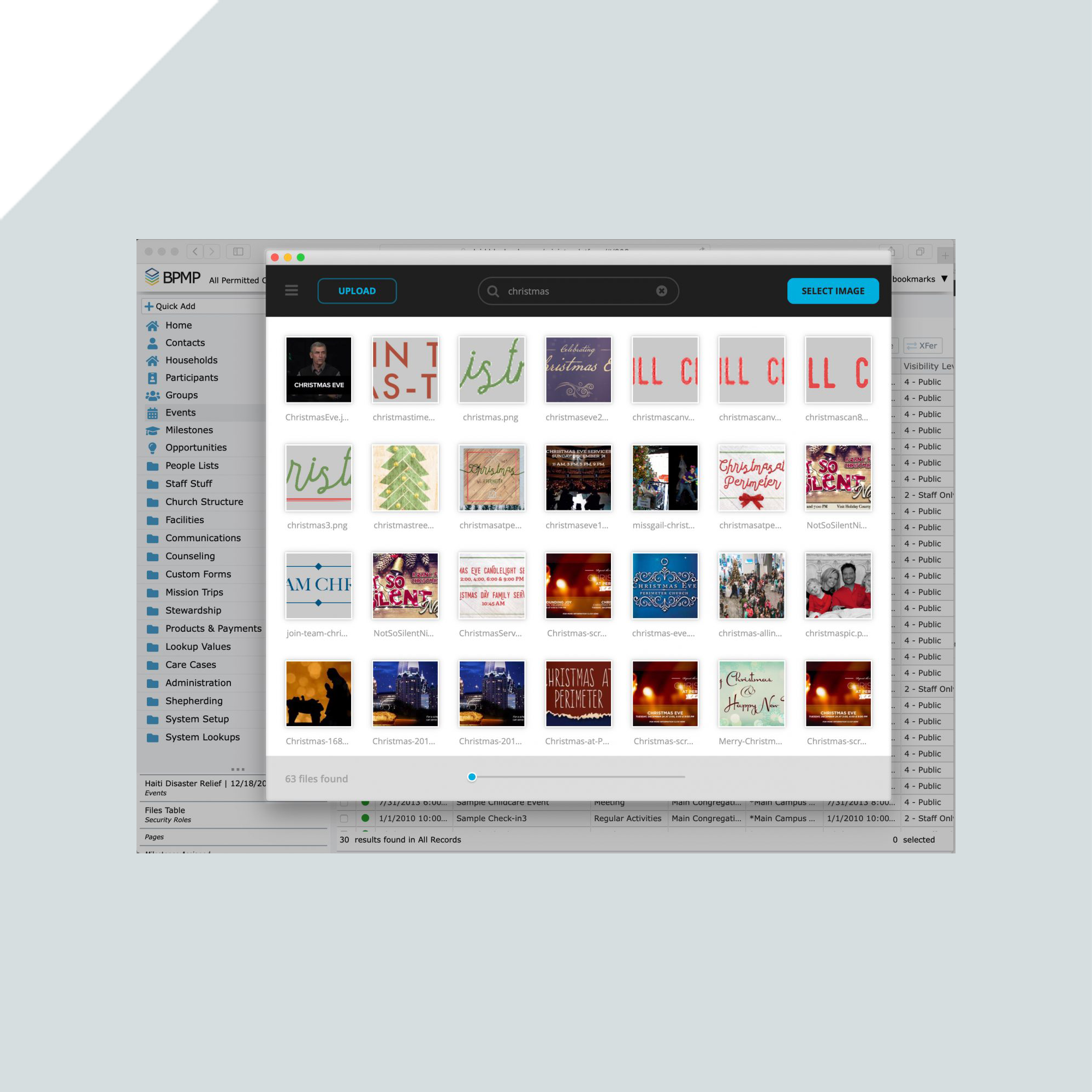 A computer screen displays an image selection window with various Christmas-themed images and album covers, showing a search for christmas and thumbnails of different holiday graphics. A computer screen displays an image selection window with various Christmas-themed images and album covers, showing a search for christmas and thumbnails of different holiday graphics.